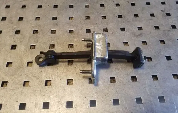 Rear door check strap stopper