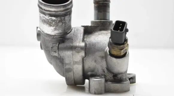 Thermostat/thermostat housing