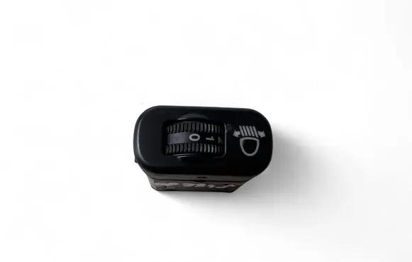 Headlight level height control switch