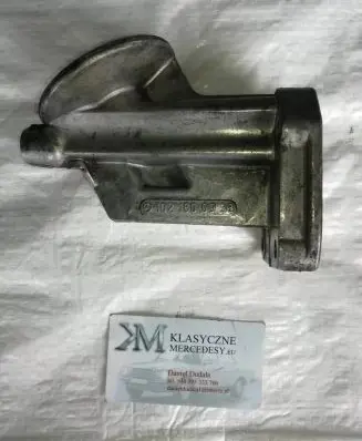 Mercedes-Benz E W124 Oil filter mounting bracket 1021800038