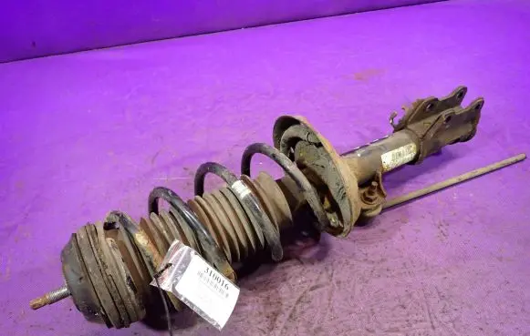 Front shock absorber with coil spring