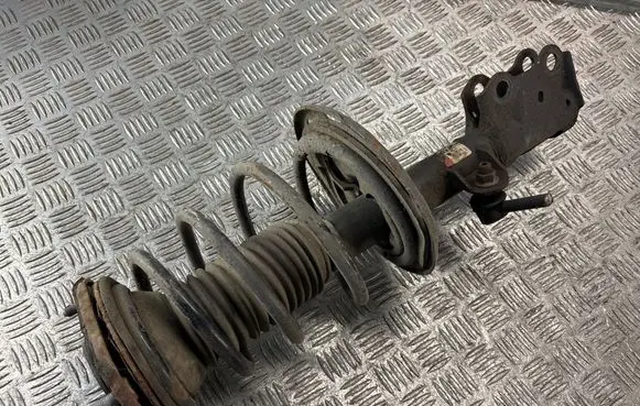 Toyota Avensis T270 Front shock absorber with coil spring