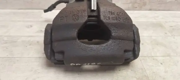 Volkswagen Touareg I Front brake caliper 