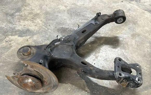 Rear wheel hub spindle/knuckle