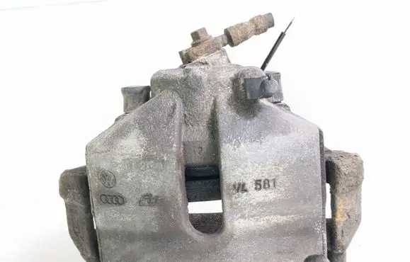 Volkswagen PASSAT B7 Front brake caliper 581
