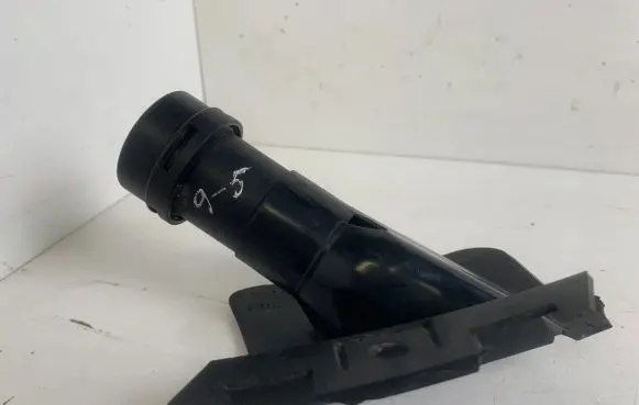 Headlight washer spray nozzle