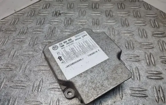 Volkswagen Touran I Airbag control unit/module 1T0909605