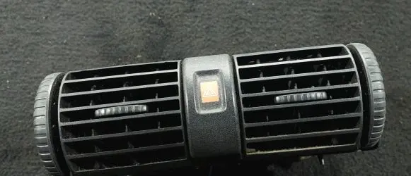 Opel Astra G Dash center air vent grill