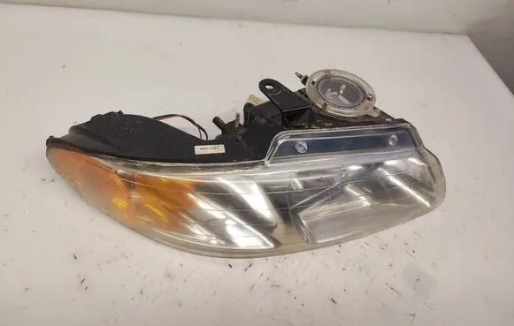 Chrysler Voyager Headlight/headlamp DG10081L 180710M