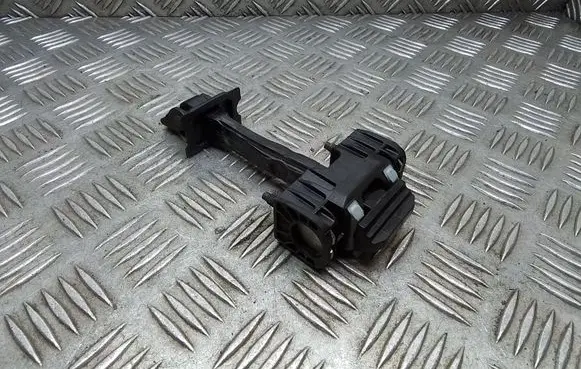 Front door check strap stopper