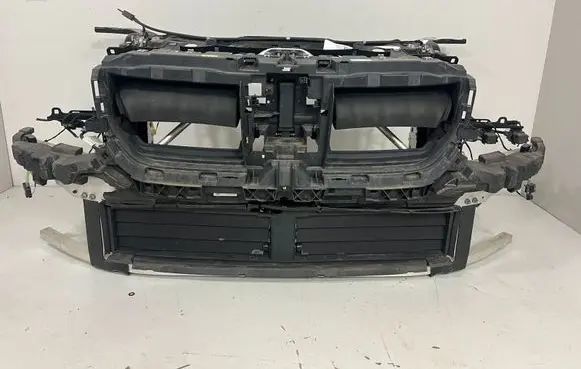 Radiator support slam panel