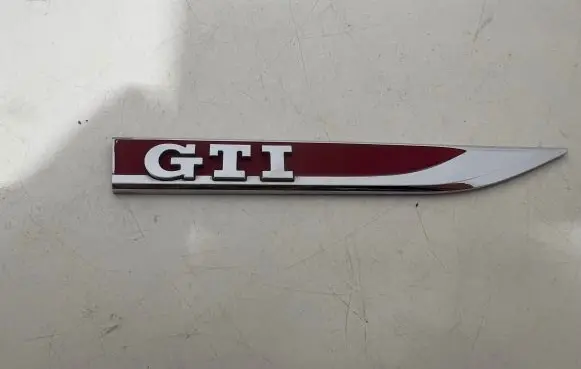 Volkswagen Golf VII Fender model badge letters 5G0853688M