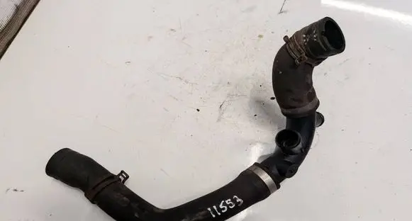 Volkswagen PASSAT B7 Engine coolant pipe/hose 1K0121087AH