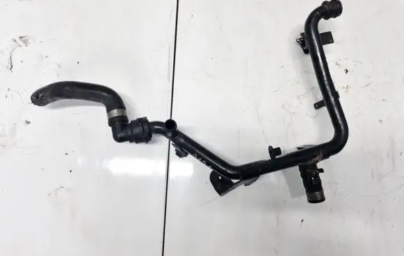 Volkswagen PASSAT B5 Engine coolant pipe/hose 038121065