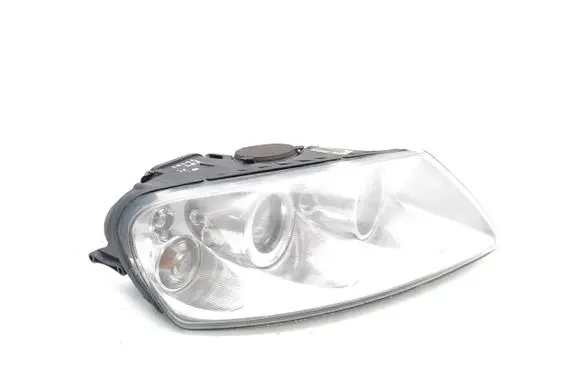 Volkswagen Touareg I Headlight/headlamp 7L6941016BL 89308481