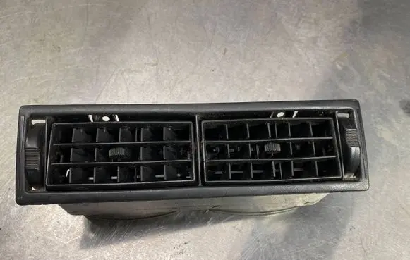 Volkswagen Golf II Dash center air vent grill 191819709C 191819704D