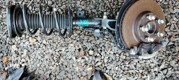 Ford Focus Front shock absorber with coil spring JX6118K001EKF