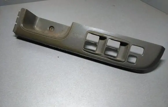 Nissan Patrol Y61 Front door window switch trim TK068096VB000