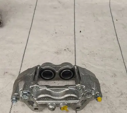 Mitsubishi Pajero Front brake caliper