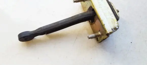 Mazda 626 Rear door check strap stopper