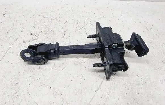 Front door check strap stopper