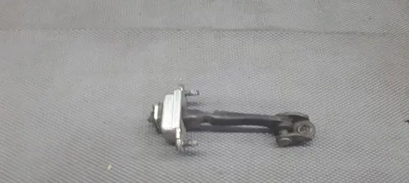 Ford Fiesta Front door check strap stopper 