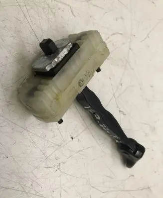 Front door check strap stopper