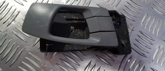 KIA Carens I Front door interior handle