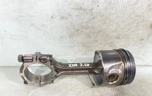 Piston with connecting rod