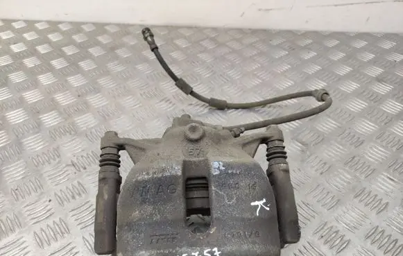 Volkswagen Golf VII Front brake caliper