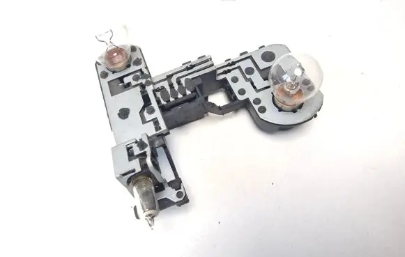 Volkswagen Touareg I Tail light bulb cover holder 7L6945280A