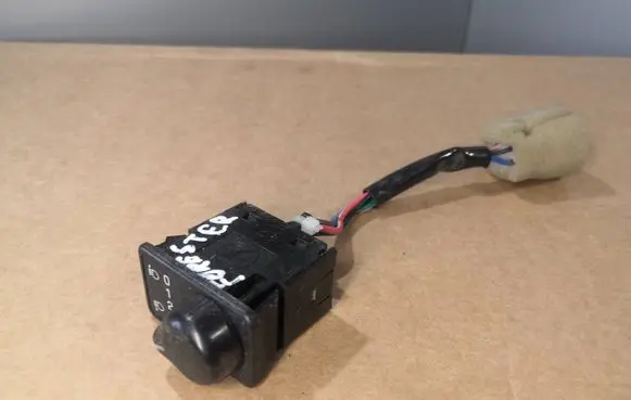Headlight level height control switch