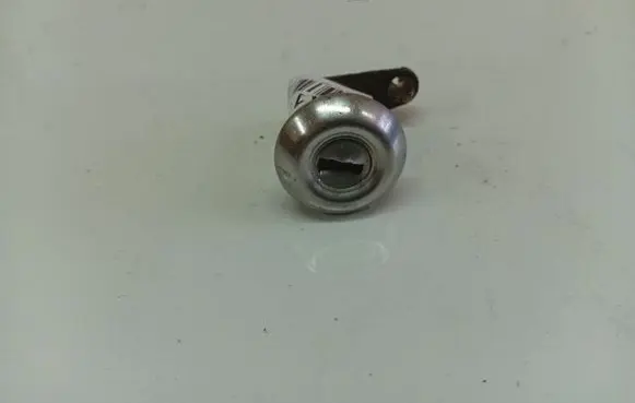Mazda 121 Front door lock (next to the handle)