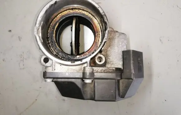 Volkswagen Golf V Throttle valve 03G128063G