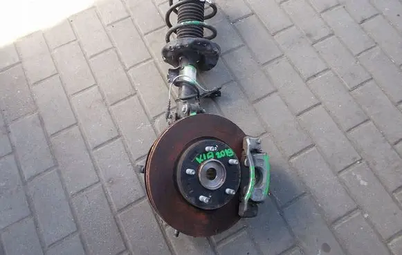 KIA Sportage Front wheel hub spindle knuckle ZWROTNICAMCPERSON