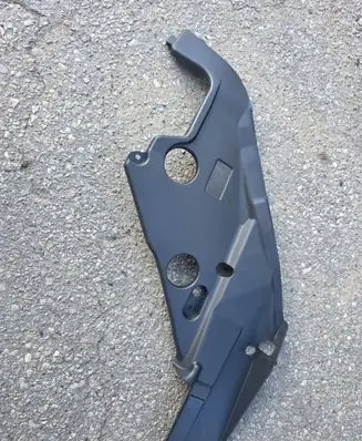 Engine bonnet/hood lock trim molding