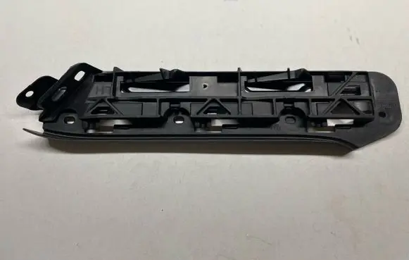 Volkswagen Touran I Front bumper mounting bracket 1T0807935