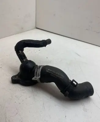 Volkswagen Golf VII Engine coolant pipe/hose 04L121131AA