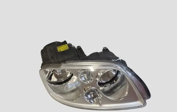 Volkswagen Touran I Headlight/headlamp 1T0941006G 0301205602