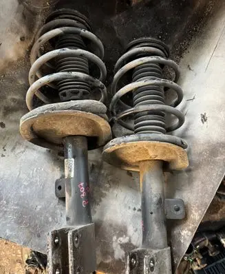 Front shock absorber with coil spring
