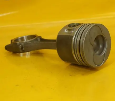 Volkswagen Golf V Piston with connecting rod 038G