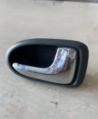 Mazda 323 Front door interior handle