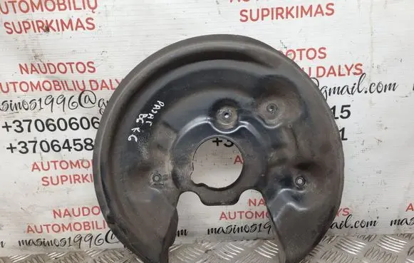 Volkswagen PASSAT B6 Rear brake disc plate dust cover 5N0615611C