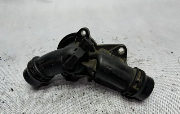 Thermostat/thermostat housing