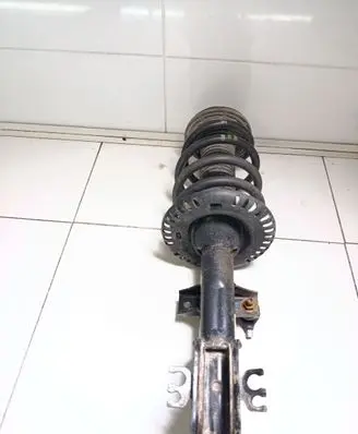 Front shock absorber with coil spring