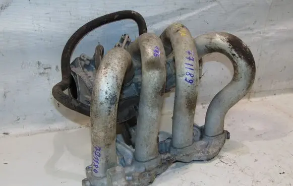 Nissan Primera Intake manifold 14010AU300 14003AU001