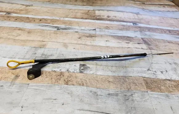 Oil level dip stick