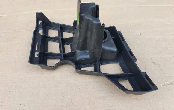 Skoda Yeti (5L) Headlight washer nozzle holder 5L0807056
