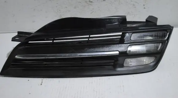 Nissan Micra Front fog light trim/grill 0724201