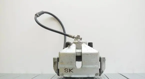 Volkswagen Jetta VI Front brake caliper 61653YJH